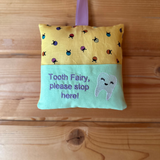 Tooth fairy cushion, ladybird print with lilac text