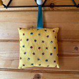 Tooth fairy cushion, ladybird print with teal text