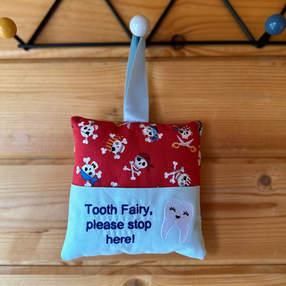 Tooth fairy cushion, skull and crossbone print