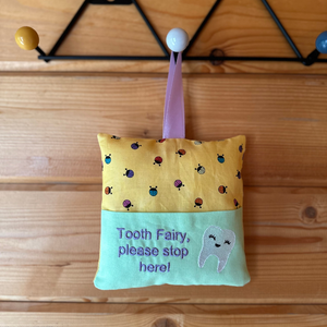 Tooth fairy cushion, ladybird print with lilac text