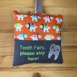 Tooth fairy cushion, orange dinosaur print